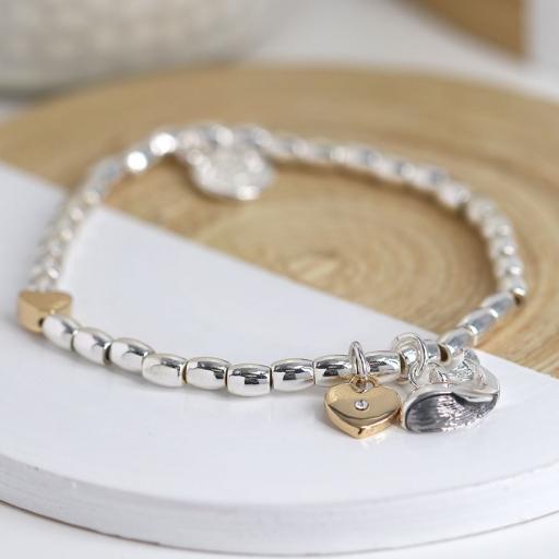 Peace of Mind Silver plated stretch bracelet with heart and whale charm