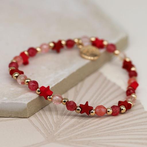 Peace of Mind Golden and raspberry bead bracelet with pink stars