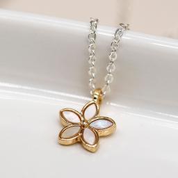 Gold Tone Flower Pendant by Peace of Mind.jpg