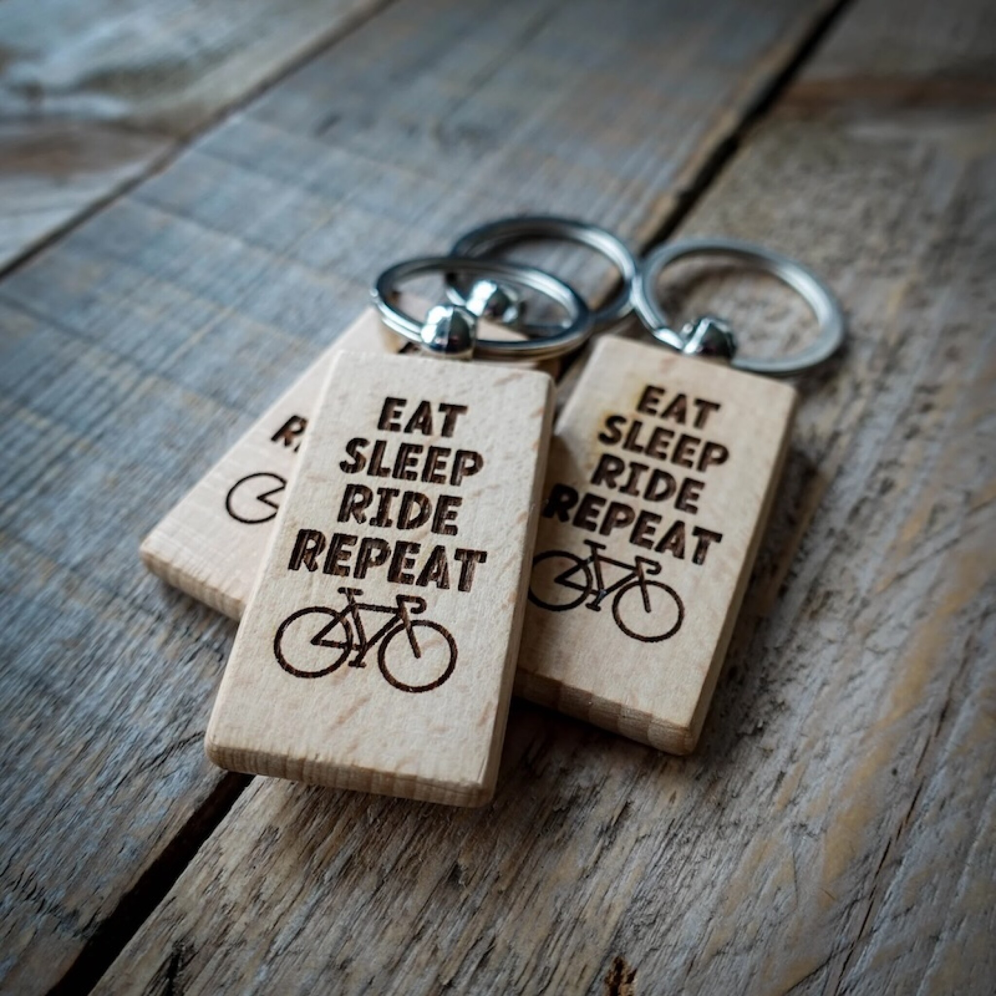 Eat-Sleep-Ride-Repeat-Wooden-Key-Ring_2000x.jpg copy.jpg