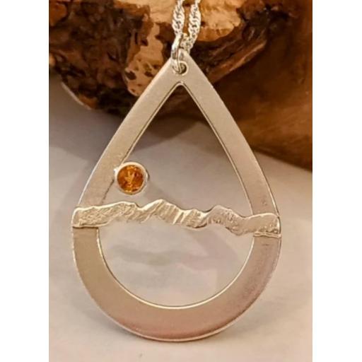 CATBELLS  PEAR SHAPE STERLING SILVER PENDANT SET WITH A CITRINE