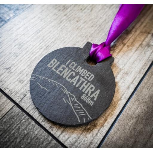 BLENCATHRA SLATE MEDAL ON PURPLE RIBBON